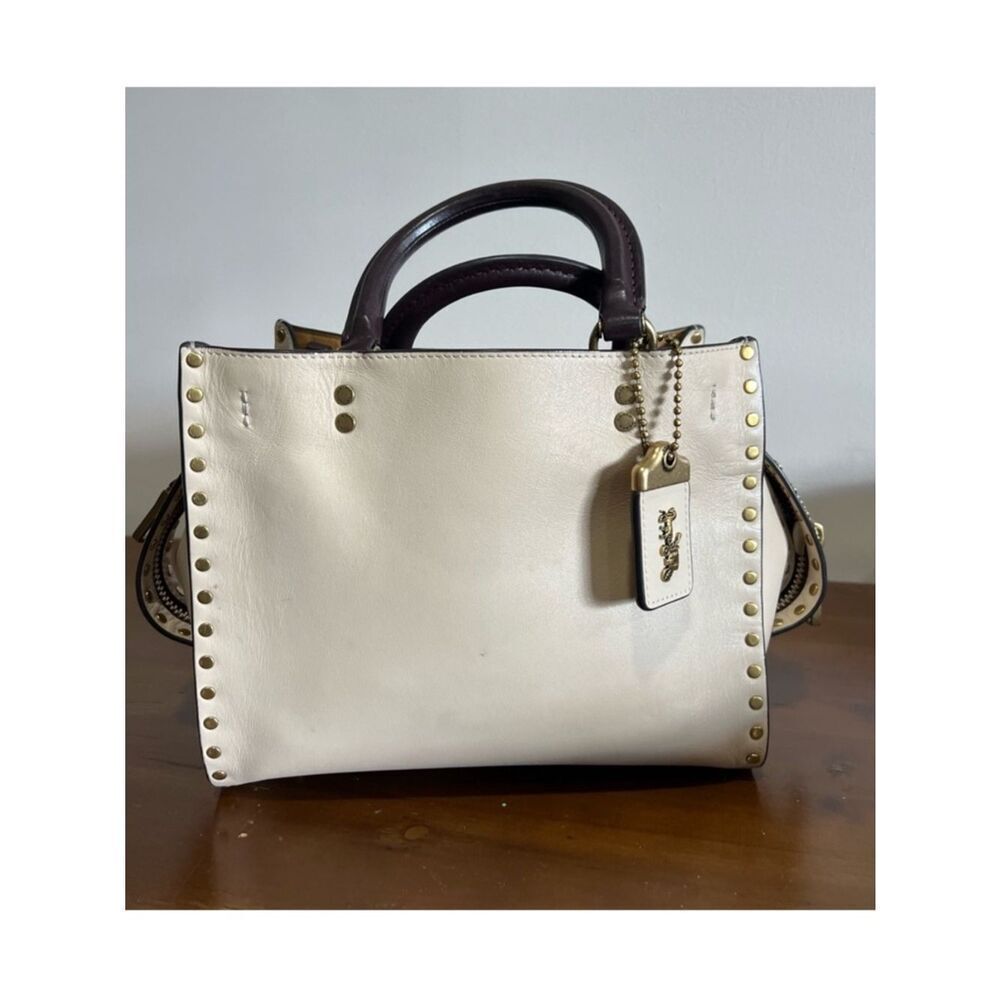 Coach Rogue 25 with Rivets